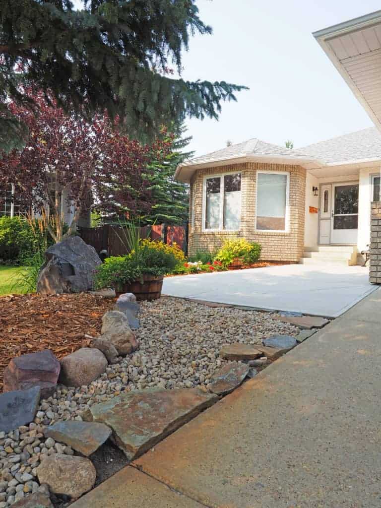 front yard at the beige bungalow