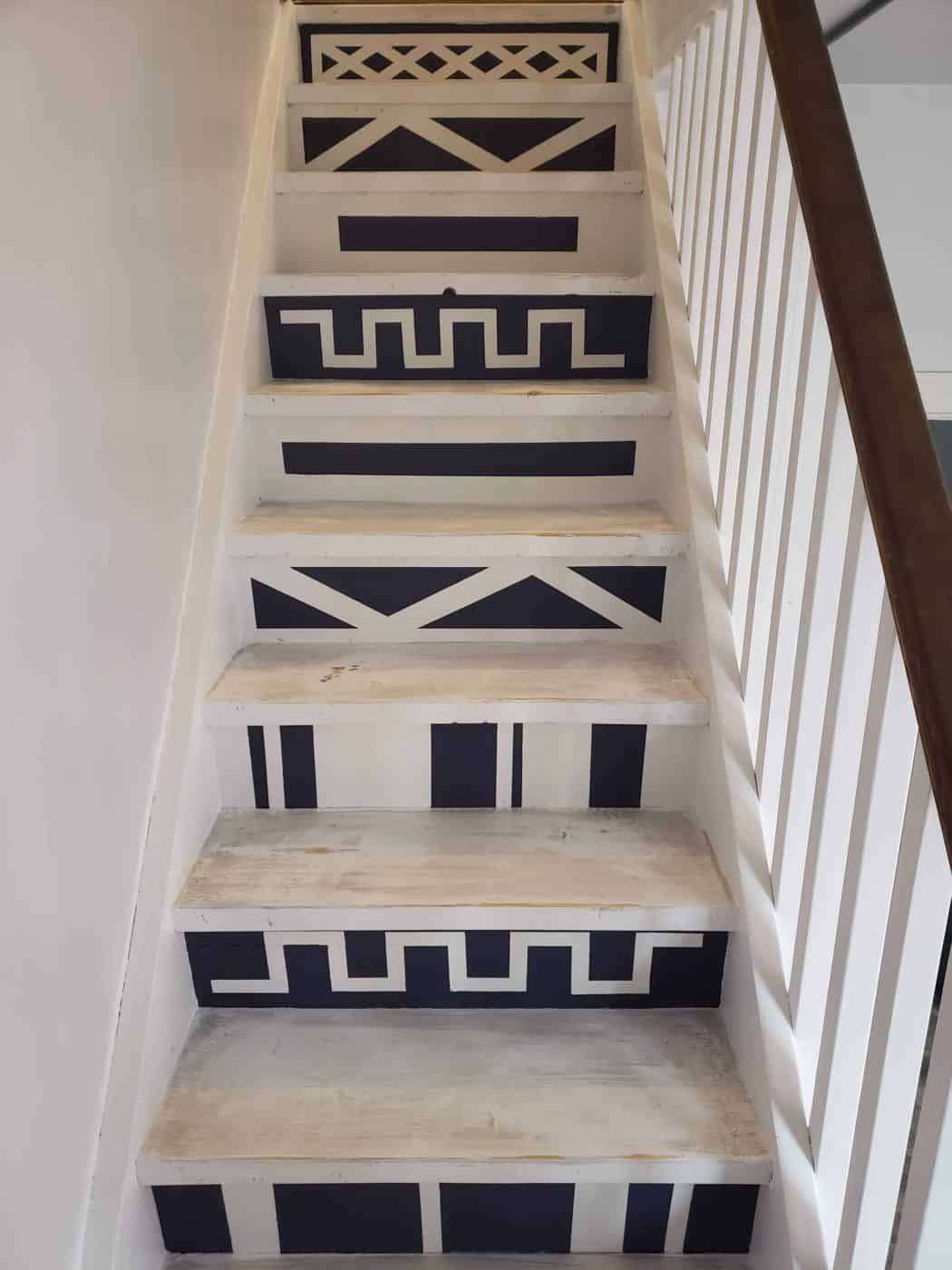 photo of using painters tape to create a pattern as a stair riser idea